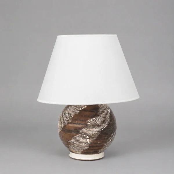 minimalist_table_lamp_on_gray_backdrop