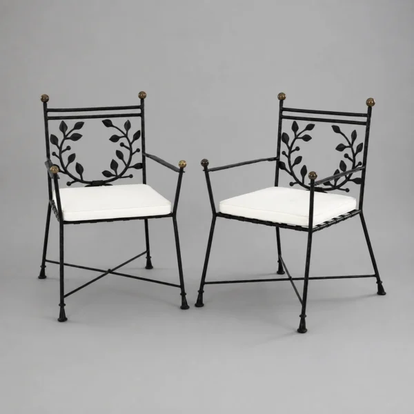 symmetrical_wrought_iron_chairs_with_leaf_designs