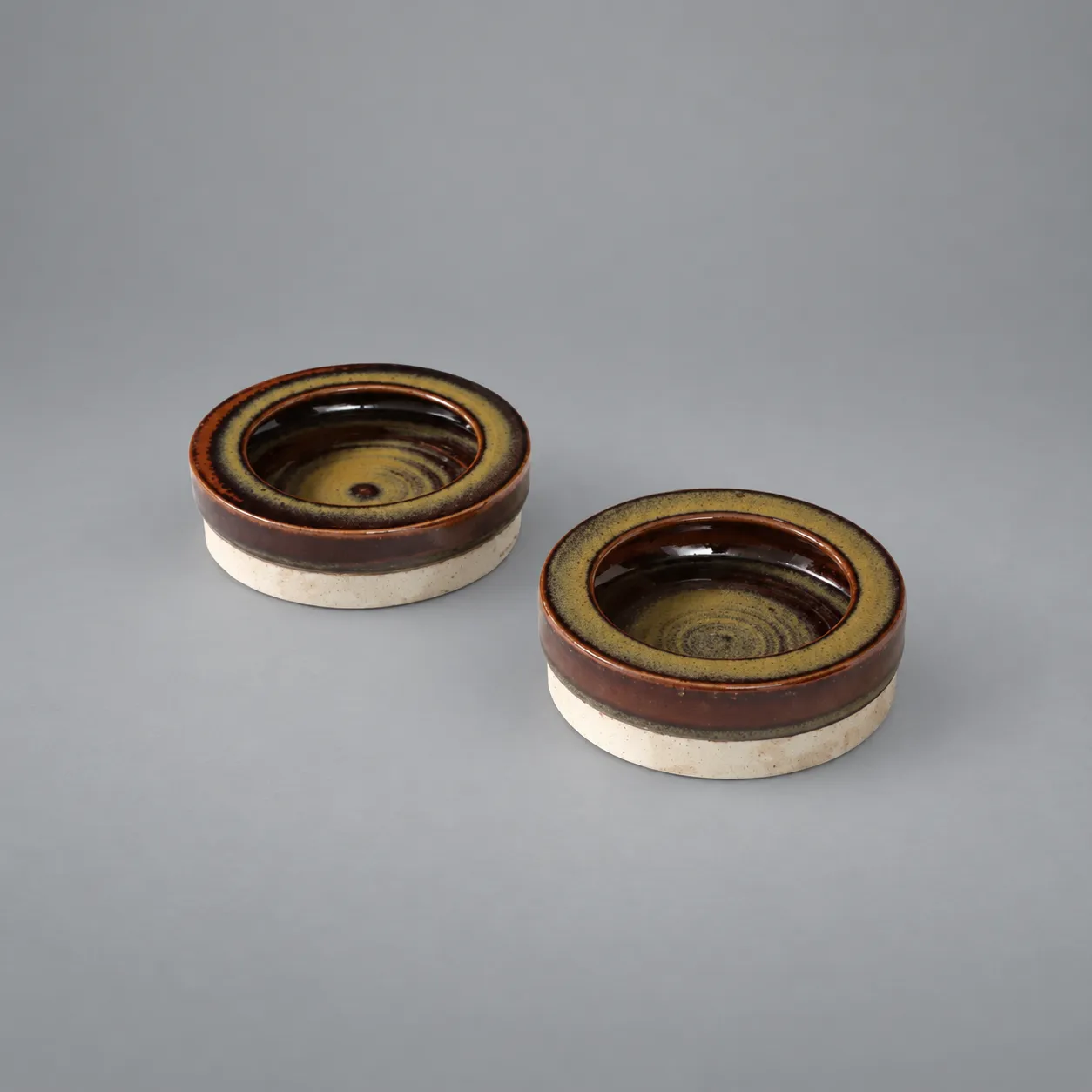 Carl Harry Stålhane (b. 1969), Rörstrand Rust Ocher & Blue Glazed Pottery Vide-Poche, 1960