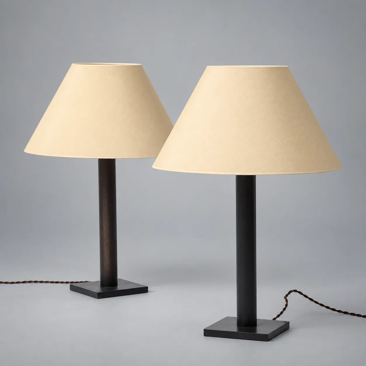 Pair Lance Thompson Bronze Patina Metal Column Lamps
